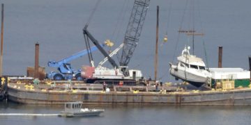 Burnt Yacht Raised From River Bottom