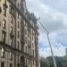 Man in the Clouds Works on The Dakota Building: See It